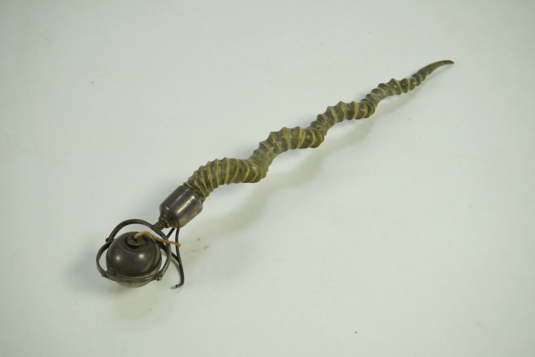 A late Victorian antelope horn handled silver orb shaped gimbal table lighter, by Joseph Braham